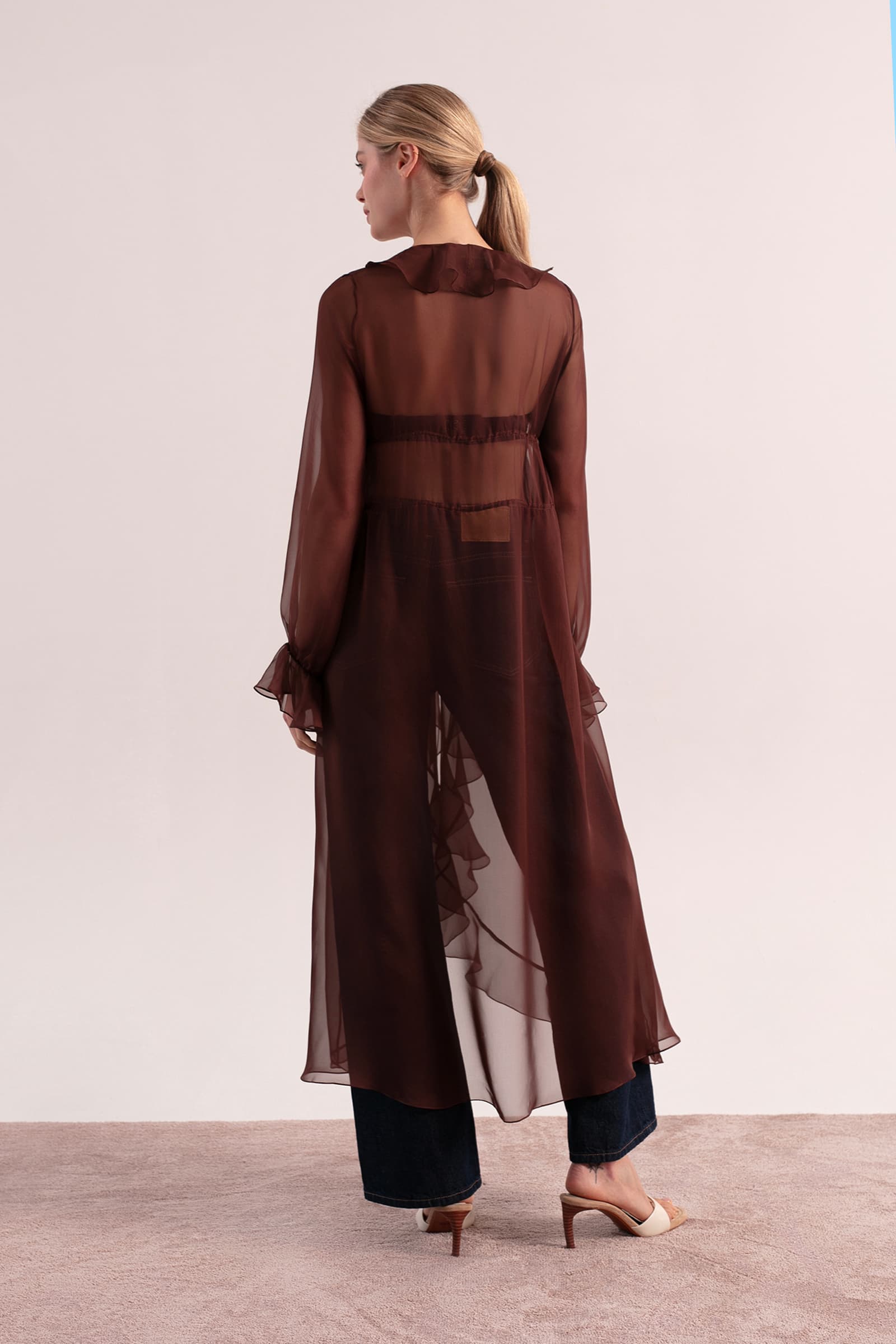Model in Mystique Cape