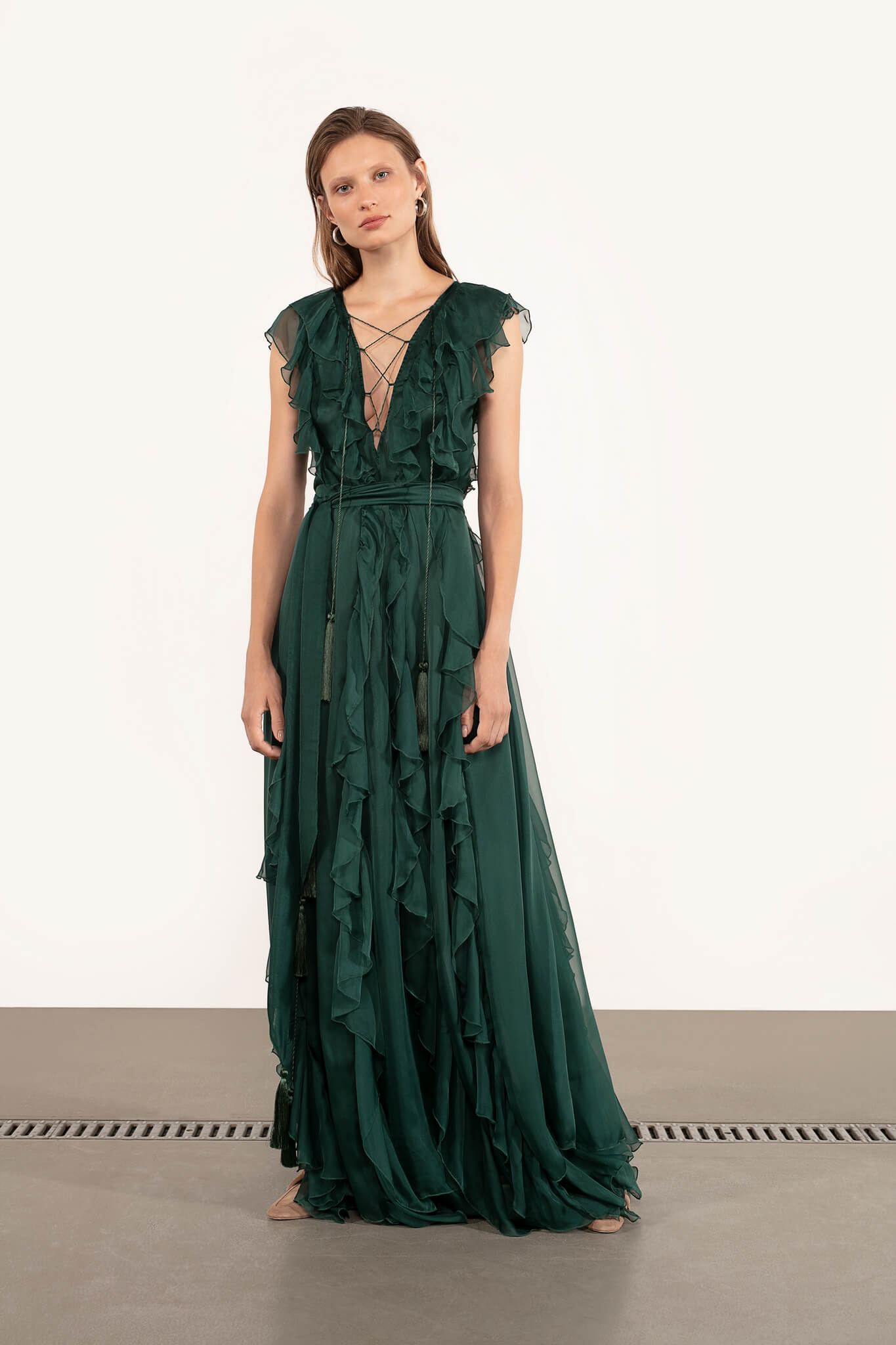 Model in green Seashell Music Dress